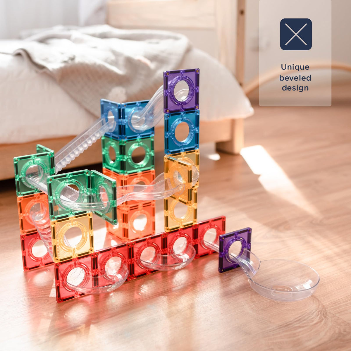 Wooden balls from CONNETIX Rainbow Ball Run add tactile engagement.