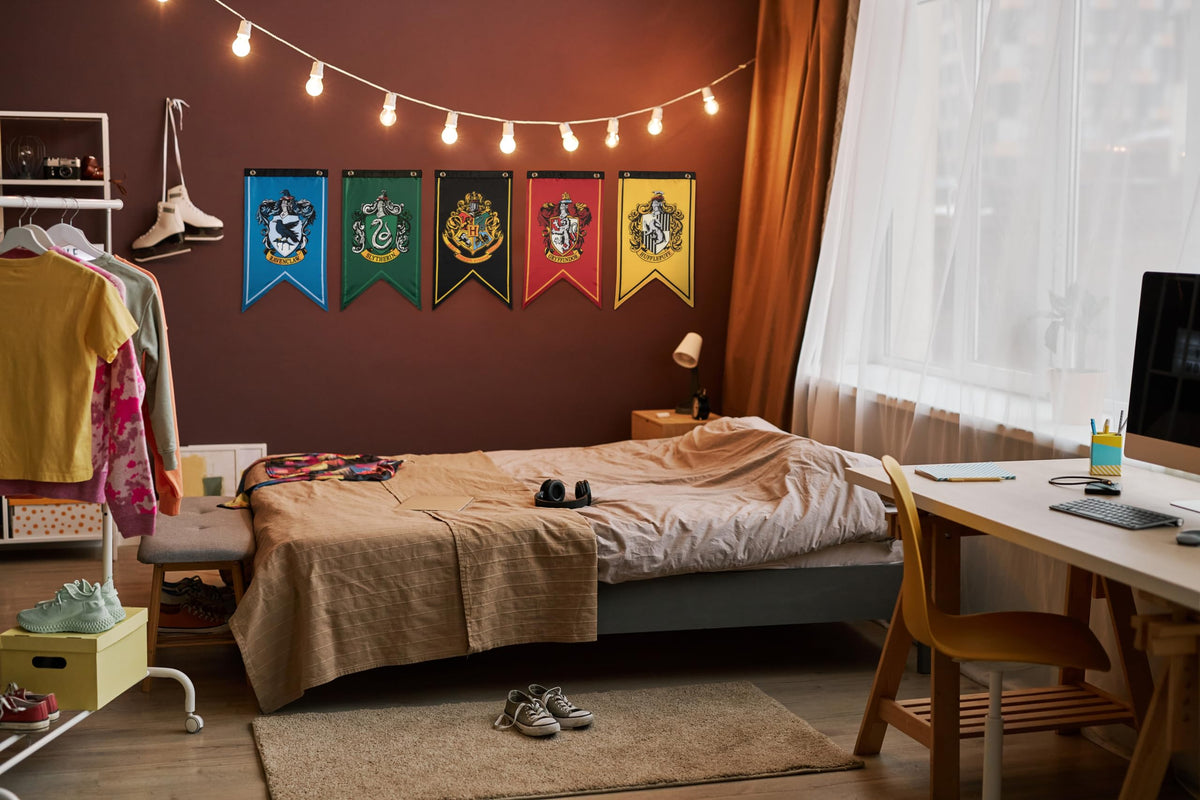 CON*QUEST Complete Hogwarts house banner set ready for display across walls.