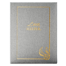 CON*QUEST Little Keeper album with grey linen cover showcases premium texture for lasting memory keepsakes.