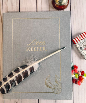 CON*QUEST Little Keeper lay-flat spiral spine allows easy photo placement and flat viewing.