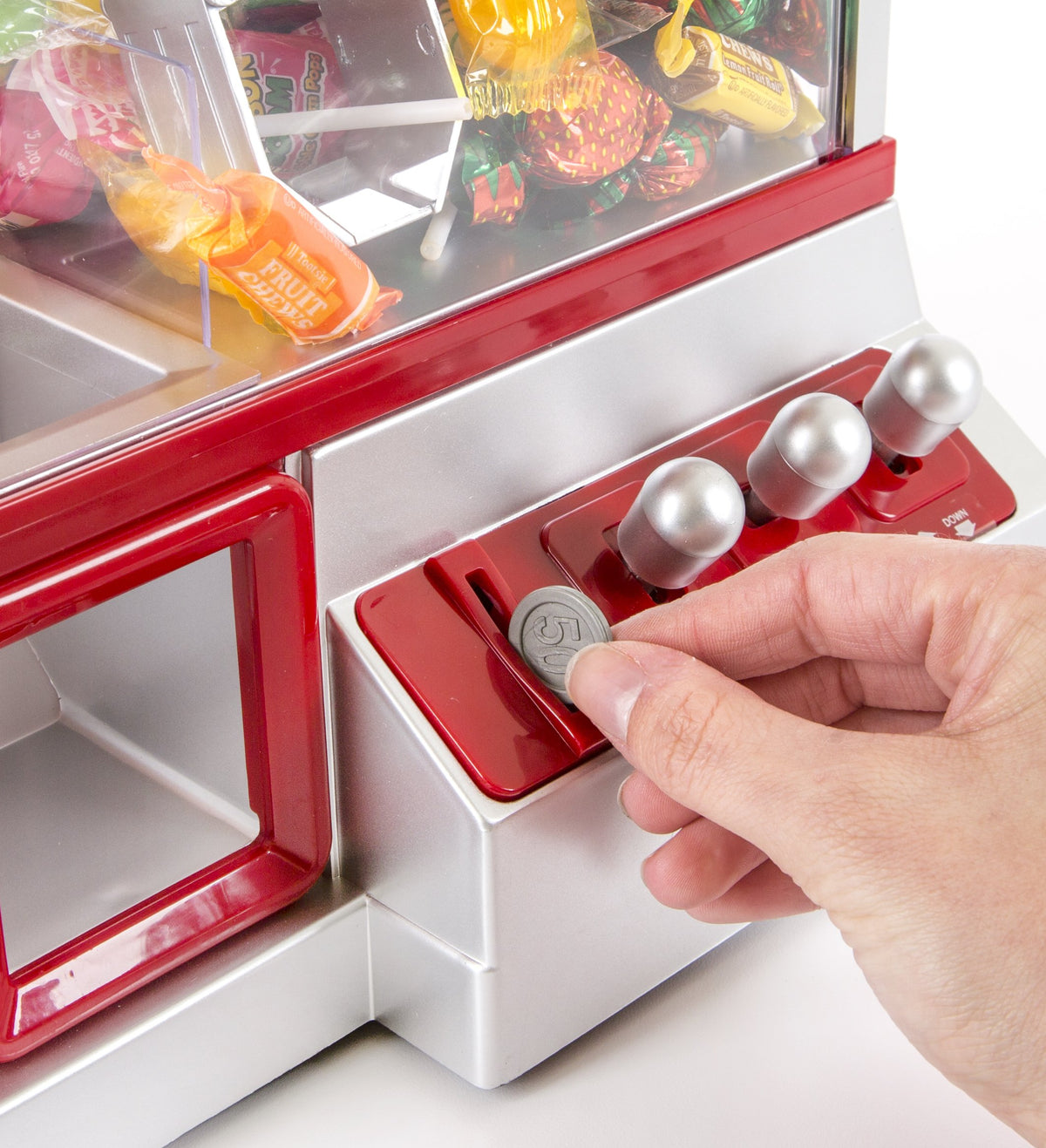 Constructive Playthings Carnival Crane battery compartment demonstrates easy setup