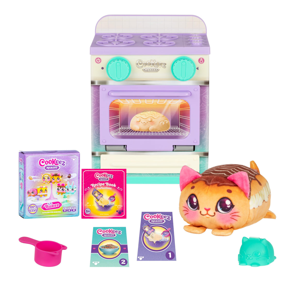 Cookeez Makery Lil' Bakez Oven opens to reveal a scented plush friend for imaginative play.