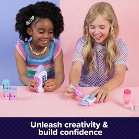 Cool Maker GO GLAM pink and purple easy-paint applicators apply color precisely.