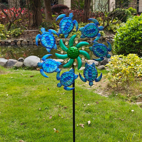 COOZZYHOUR metal wind spinner garden decor with turtle detail enhances outdoor ambience.
