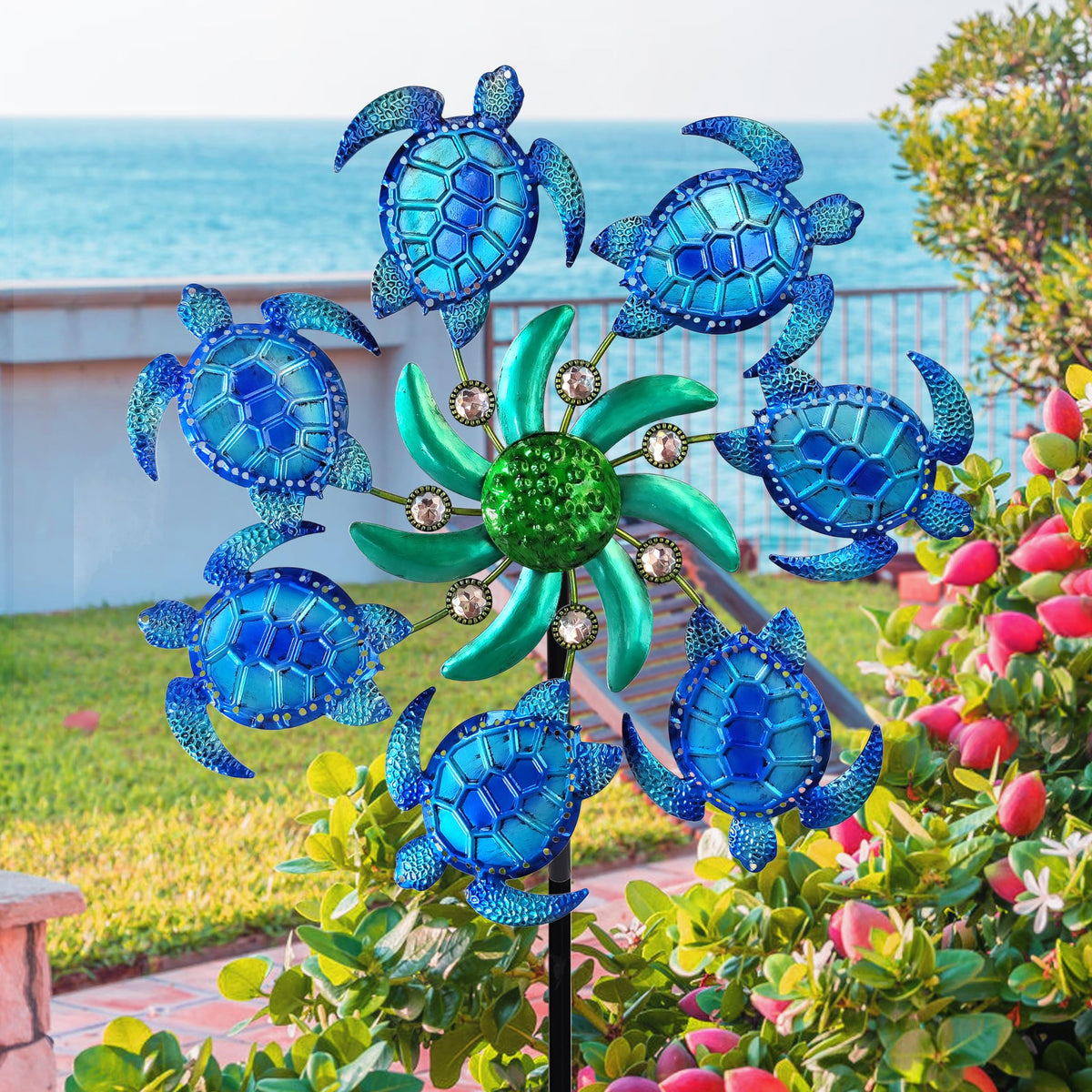 COOZZYHOUR sea turtle wind spinner stake in blue adds motion to your garden.