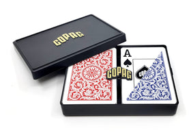 Copag 1546 playing cards in red and blue with bridge-size narrow format for smooth shuffles.