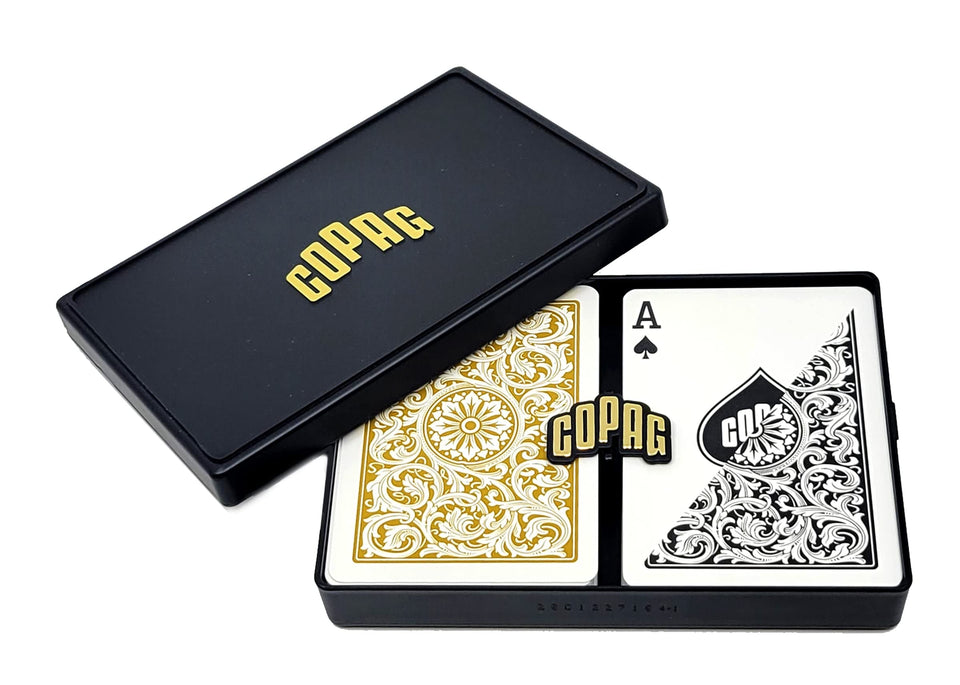 Copag 1546 design plastic playing cards deck with sleek black and gold finish for durability.