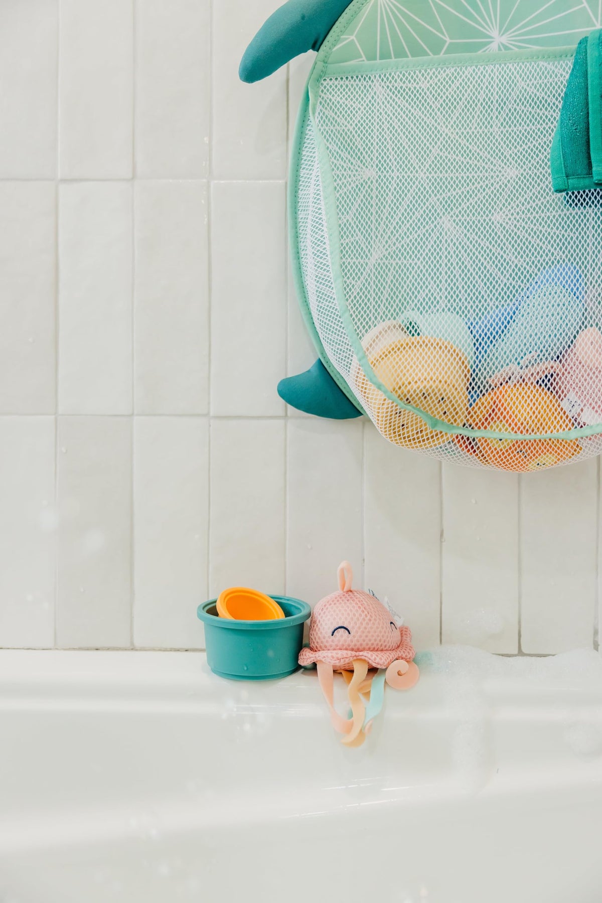Copper Pearl Oceana bath toy holder offers versatile, easy-access storage for tub toys.