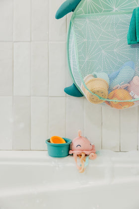 Copper Pearl Oceana bath toy holder offers versatile, easy-access storage for tub toys.