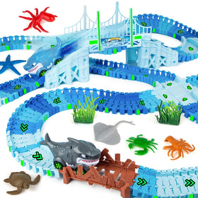 Coroiesty shark race tracks glow in the dark for immersive night play.