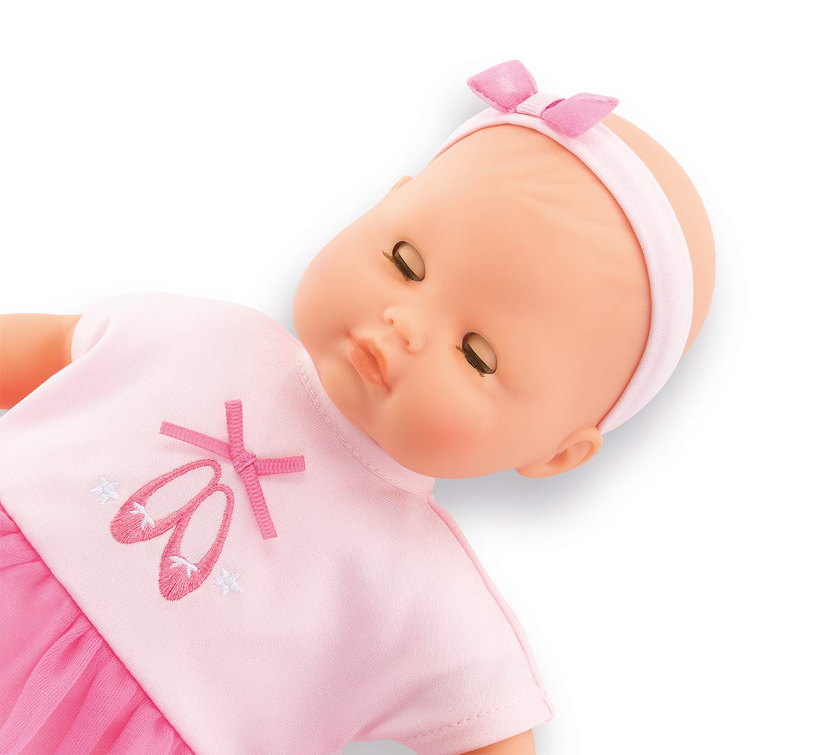 Maeva in ballet outfit with ribbon laces encouraging nurturing dress-up play.