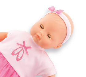 Maeva in ballet outfit with ribbon laces encouraging nurturing dress-up play.