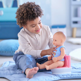 Corolle removable potty seat aids easy setup and use for toddlers.