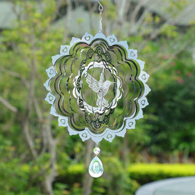 CosyCorner 3D wind spinner outdoors reflects sunlight to brighten the yard.