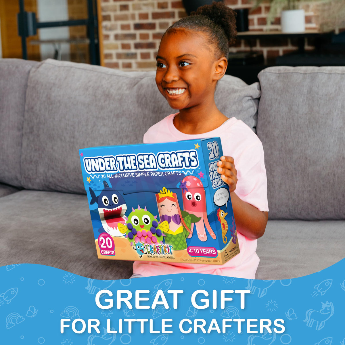 Craftikit shark paper craft shows kids turning ocean shapes into art.
