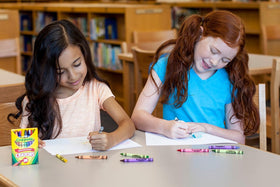Crayola crayons in a group art session encouraging teamwork
