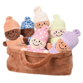 Cre8tive Minds six-doll set in a plush basket for inclusive, playful learning.