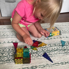 CreateOn Crayola Retro PIP tiles glow in the dark for after-hours building fun.