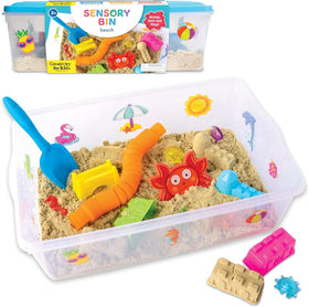 Creativity for Kids Beach sensory bin showing sand and shells for imaginative play