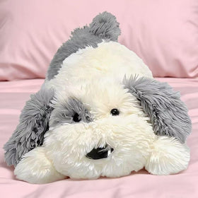 Crillop plush dog used as a sleeping aid in a bedroom