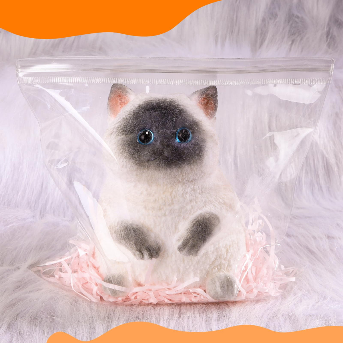 CritterCopia Big Taba Cat toy in hand, durable, portable stress relief on the go.