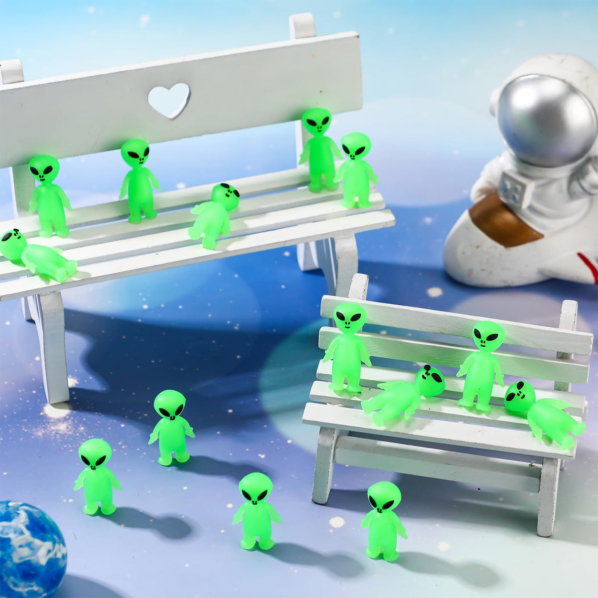 CroBlissful glow-in-the-dark aliens enhancing dim-light fun.