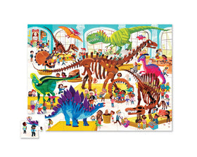 Children assemble Crocodile Creek above and below puzzle on the floor for family play.