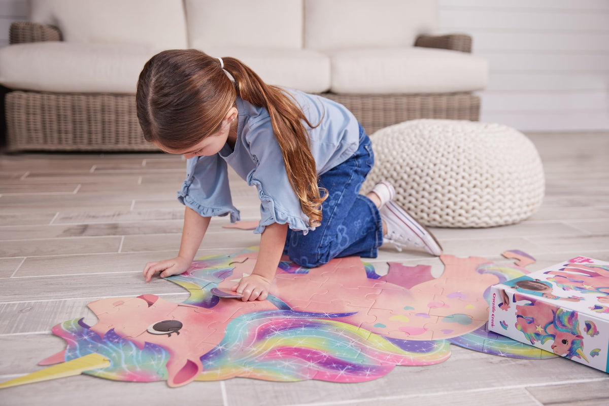 Crocodile Creek Above + Below finished unicorn puzzle displays colorful, engaging artwork.