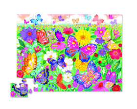 Crocodile Creek Butterfly Garden puzzle assembled on the floor demonstrates the finished scene.