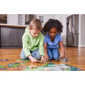 Crocodile Creek family-friendly puzzle supports cooperative play and shared problem solving.
