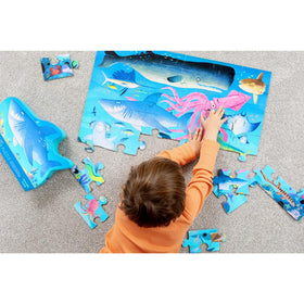 Crocodile Creek 24 by 18 inch finished puzzle fits on living room floors