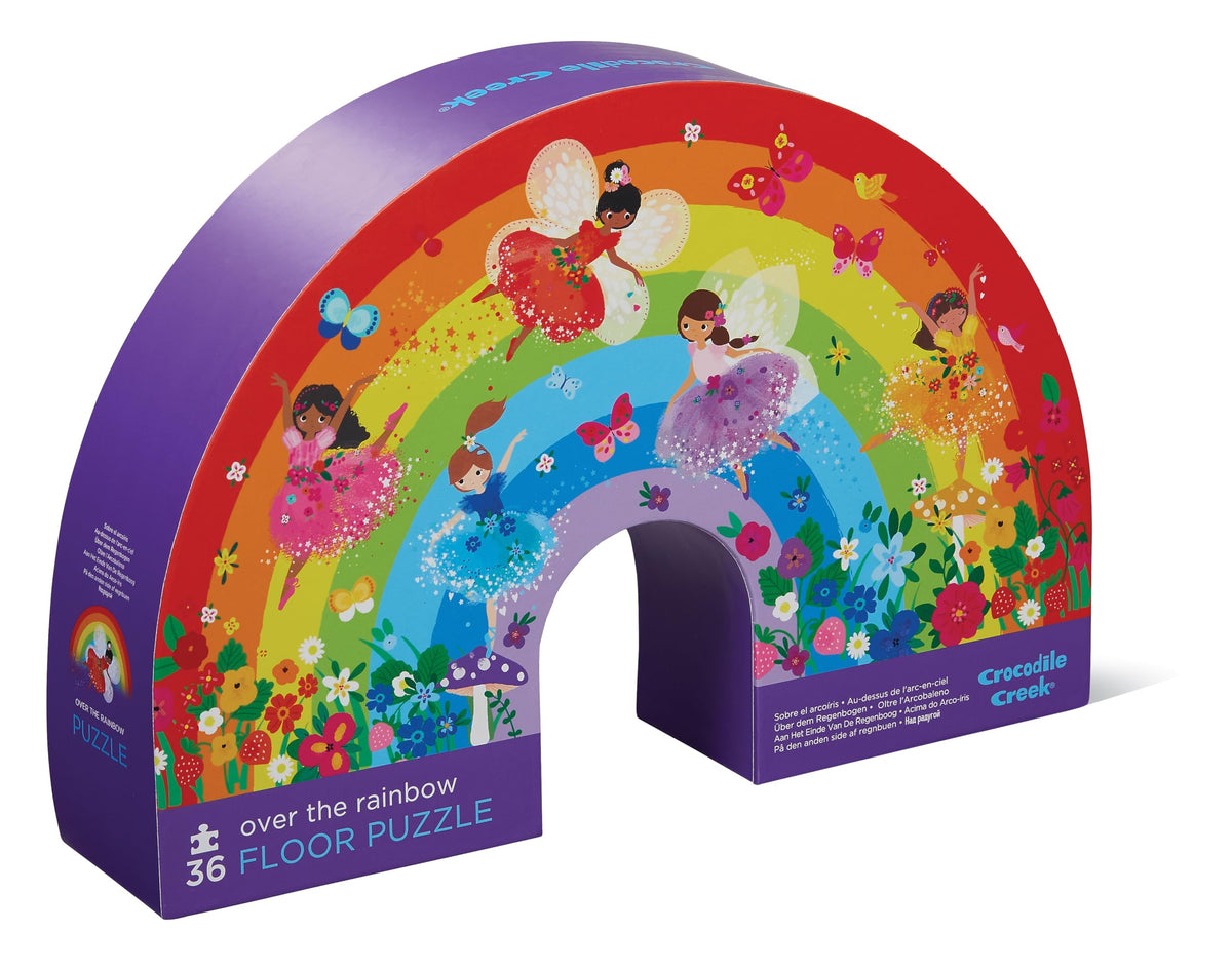 Crocodile Creek over-the-rainbow puzzle on the floor, great for screen-free play.