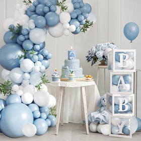 CROSSFINGERS white balloons set enhances photo-ready decor for boy celebrations.