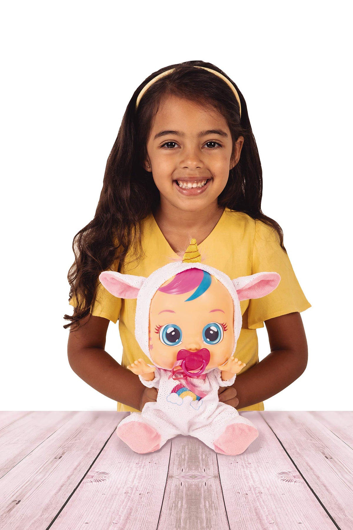 Cry Babies Dreamy unicorn 12inch doll interchangeable onesie enables mix and match outfits.