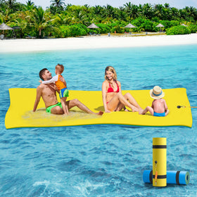 CTSC Lily Pad Floating Mat setup on calm water for family lounging and games.