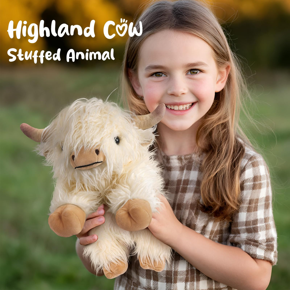 Cuckool Highland Cow plush resting on belly designed for easy play