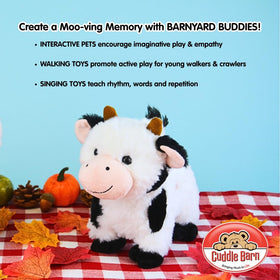 Cuddle Barn cow plush with batteries included for immediate play.