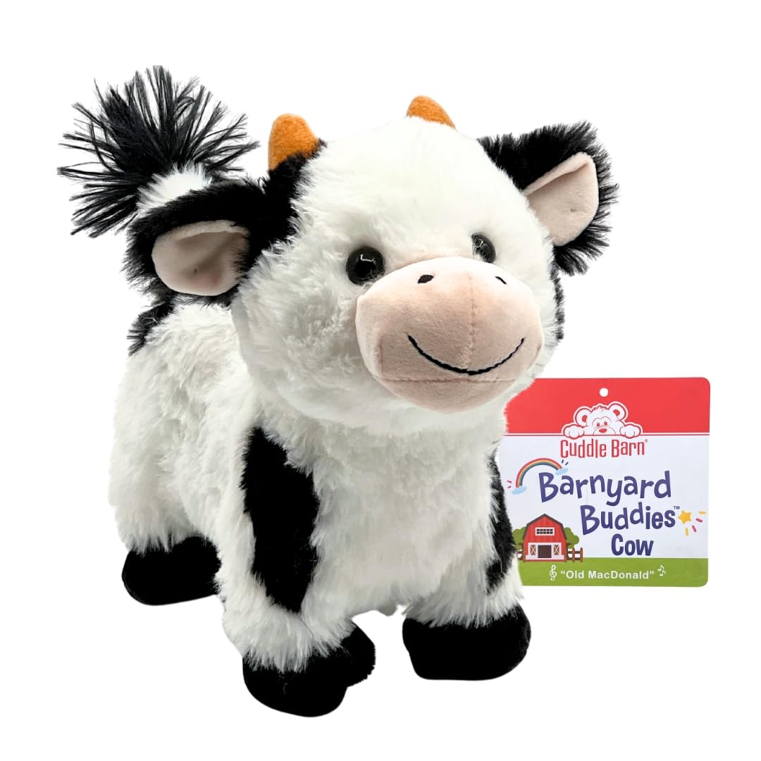 Cuddle Barn Walking Cow plush ready to walk and sing Old MacDonald for kids.