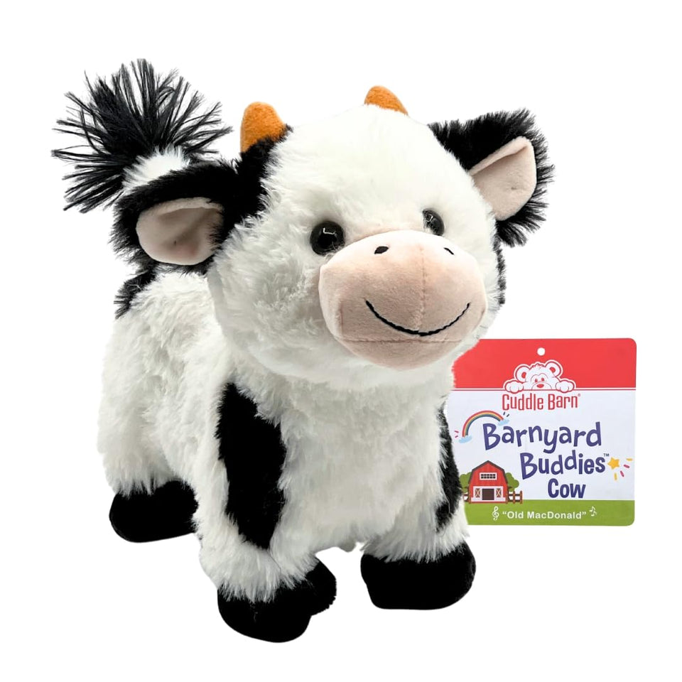 Cuddle Barn Walking Cow plush ready to walk and sing Old MacDonald for kids.