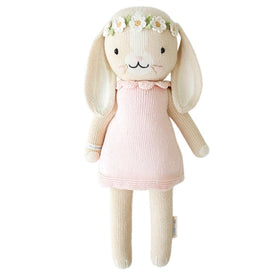 cuddle + kind Hannah Bunny 20-inch doll offers soft cotton comfort for gentle hugs.