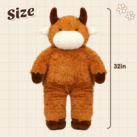 Close-up of Cudhug 32 inch Highland Cow face with embroidered expression