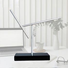 CulinaryEdge kinetic energy sculpture side angle emphasizes a calm hypnotic motion in any workspace.