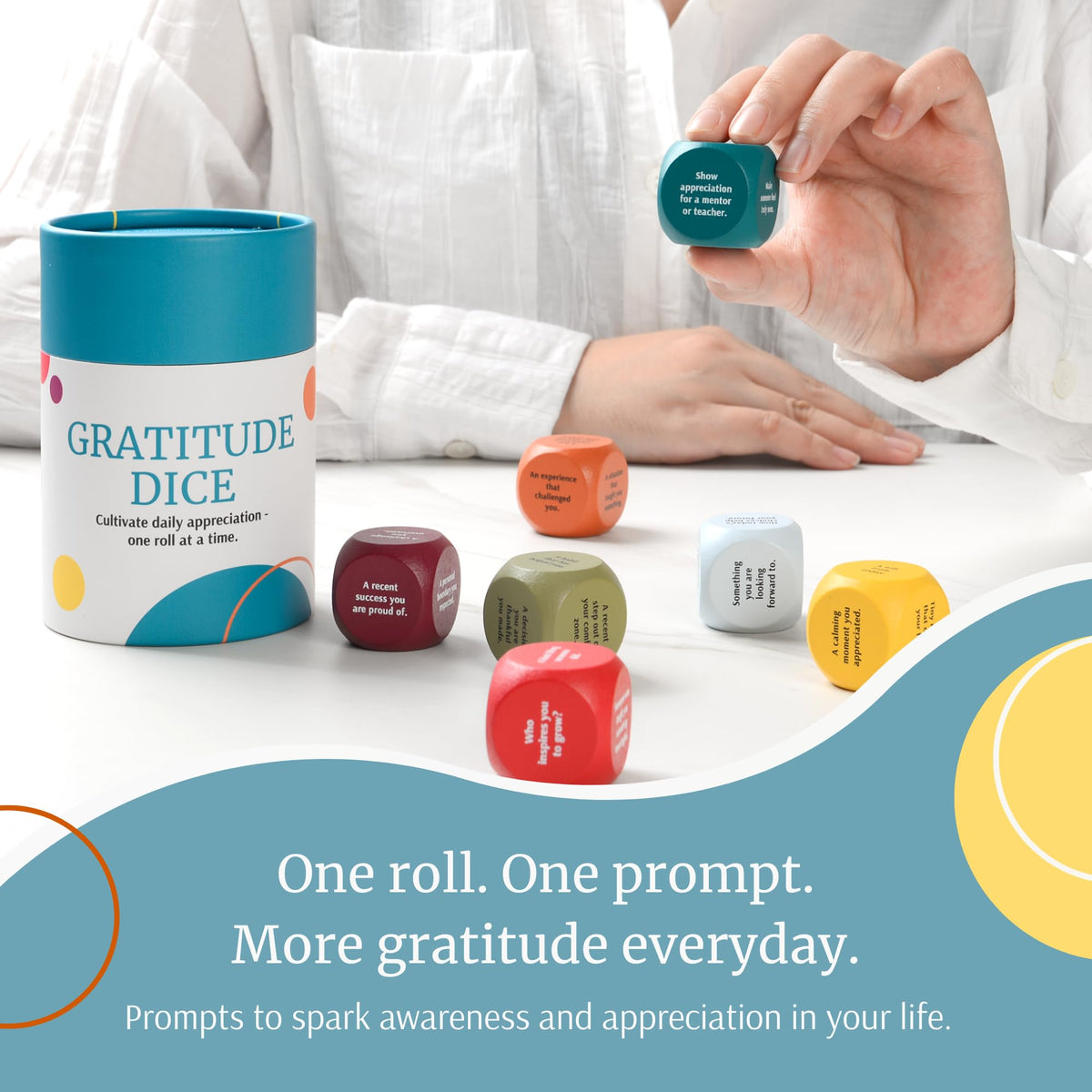 Curiosity Driven Gratitude Dice Set rolled dice with visible prompt for journaling.