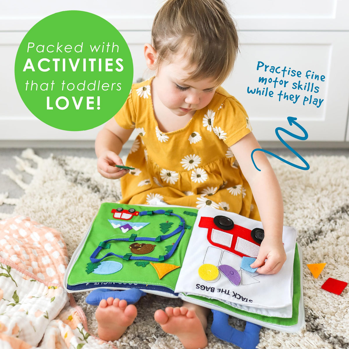 Pack bags page in Curious Columbus Quiet Book engages fine motor play