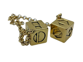 Custom 3D Stuff Smuggler's Dice with antique weathered gold plating for cockpit decor