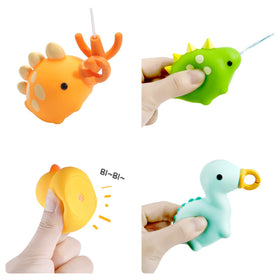 Cute Stone dinosaur egg sprays water when squeezed, adding playful anticipation to bath time.