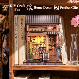Cutebee 3D puzzle miniature with LED lighting enhances warm shelf ambience.