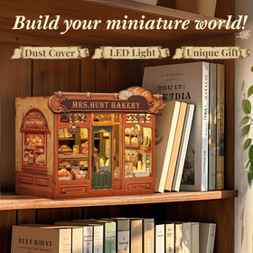 CUTEBEE Book Nook Kit interior with tiny dolls for a cozy display