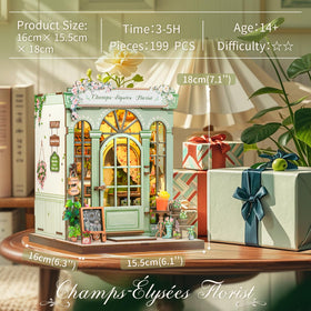 Cutebee Book Nook Kit assembly scene showing hands building