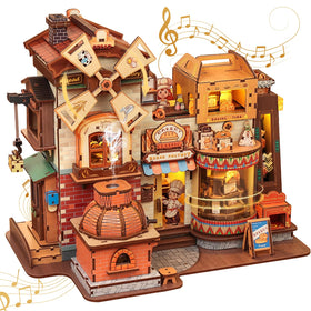 CUTEBEE Bread Factory diorama assembly on a desk shows detailed wooden craft